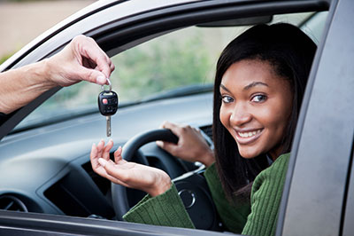 image of teen girl getting ready to drive
