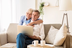 older couple looking at laptop