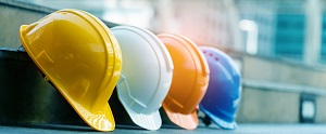 hard hats on handing