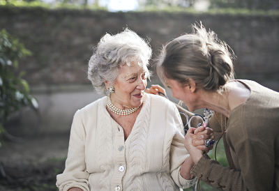 a woman with her elderly mother