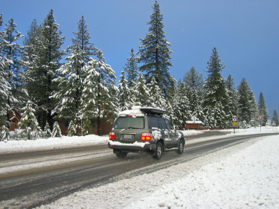 image of car driving in snow